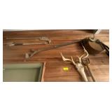 Rustic Farm Tools and Deer Skull Wall Display