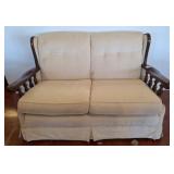 Beige Upholstered Loveseat With Wooden Armrests