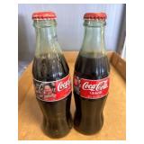 Two Coca-Cola Classic 8 oz Commemorative Bottles