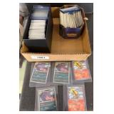 Box Lot of Pokemon Trading Cards in Sleeves and Ti