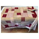 Patchwork Quilt with Red and Beige Tones