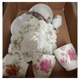 Porcelain Cups, Plates, and Vase