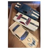Three Vintage Model Cars with Stripe Details