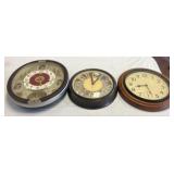 Three Wall Clocks in Varied Styles