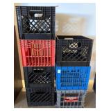 Stacked Plastic Storage Crates in Various Colors