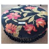 Round Upholstered Ottoman with Floral Pattern