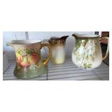 Three Hand-Painted Ceramic Pitchers