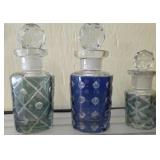 Three Glass Perfume Bottles with Stoppers