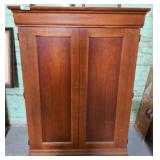 Wooden Cabinet with Shelves and Power Outlet