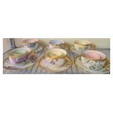 Hand-Painted Teacup and Saucer Set, Signed J. Sell