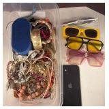 Jewelry, Sunglasses, Speaker, and iPhone