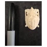 Carved Decorative Ivory-Tone Head Pendant