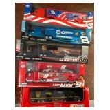 5 NASCAR 1:64 Scale Racing Transporter Models