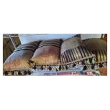 Four Decorative Throw Pillows with Tassels