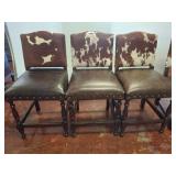 Three Cowhide and Leather Type Bar Stools