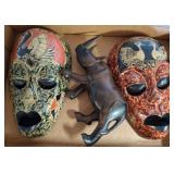 Two Painted Masks and Wood Carved Rhino Figurine