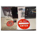 Vinyl Records and Metal Sign