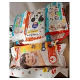 Packs of Huggies Diapers
