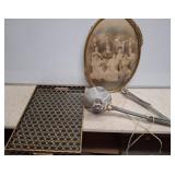 Framed Photograph, Heat Lamp, and Metal Tray