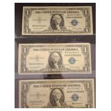 Three 1957 $1 Silver Certificates