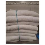 Stacked White Cotton Towels in Bundles