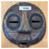 Handcrafted Wooden Mask with Beaded Decoration