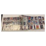 Binder of Mixed Sports Cards in Plastic Sleeves