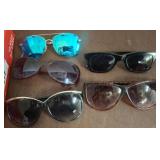 Sunglasses, Nail Polishes, and Pipe