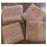 Four Red and White Patterned Cushions