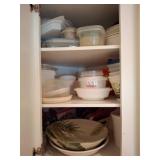 Cupboard With Plastic Containers lids and Plates