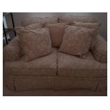 Bassett Loveseat with Beige Floral Upholstery