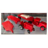 Red Carved Wooden Trucks and Trailers