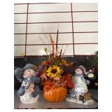 Snowman Figurines and Pumpkin Floral Arrangement