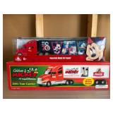 Two Disney-Themed Toy Trailer Trucks