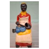 Painted Cast Iron Figurine of Woman with Spoon