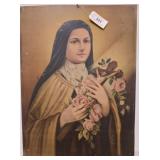 Metal Religious Artwork With Saint Imagery