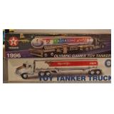 Two Boxed Toy Tanker Trucks by Texaco and Exxon