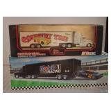 Two 1:64 Scale Die-Cast Truck Transporters