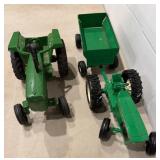 Green Toy Tractors with Trailer Attachments