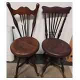 Two Wood Swivel Chairs with Claw Feet