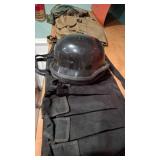 Military Gear Lot with Helmets and Camouflage Coat
