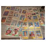 Baseball Cards and Player Stats Sheets
