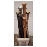Baseball and Softball Bats in Bin