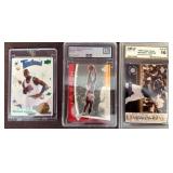 Three Michael Jordan Trading Cards in Cases