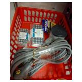Basket of Assorted Batteries and Cables