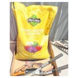 Gardening Tools and Bag of Soil