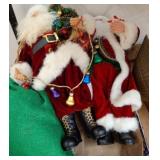 Santa Claus Figurines in Red Velvet Outfits