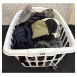 Baseball Caps in Plastic Laundry Basket