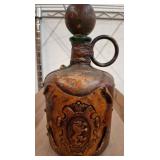 Decorative Bottle with Embossed Crest Design