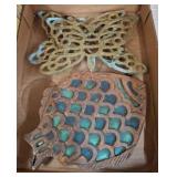 Two Cast Metal Trivets with Butterfly and Fish Mot